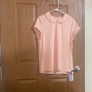 Golf shirt large in pale pink
